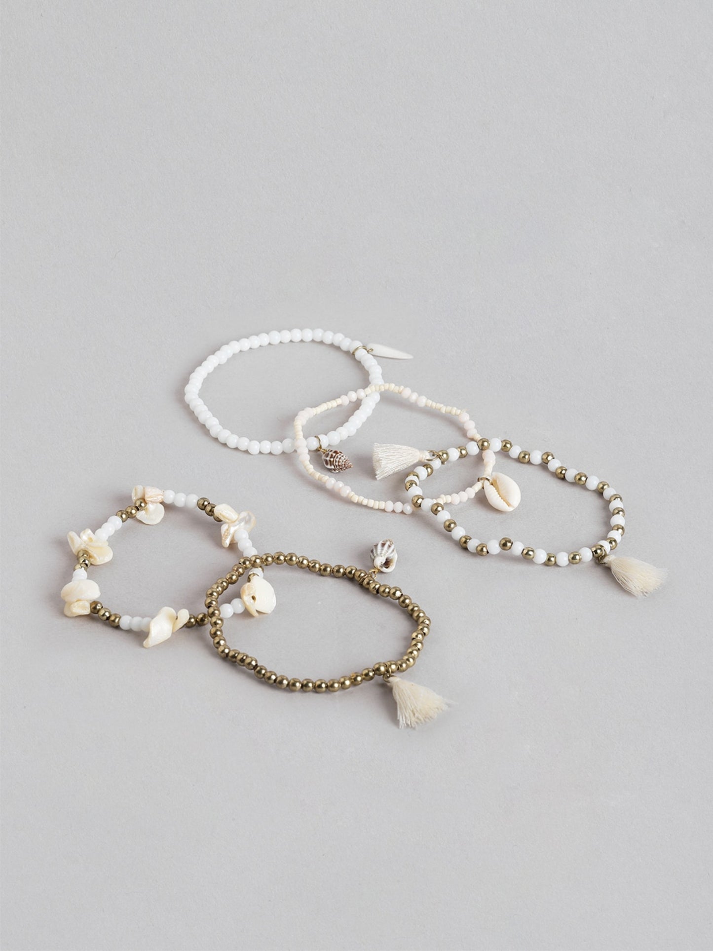 Blueberry Set of 5 White and Gold beaded bracelet