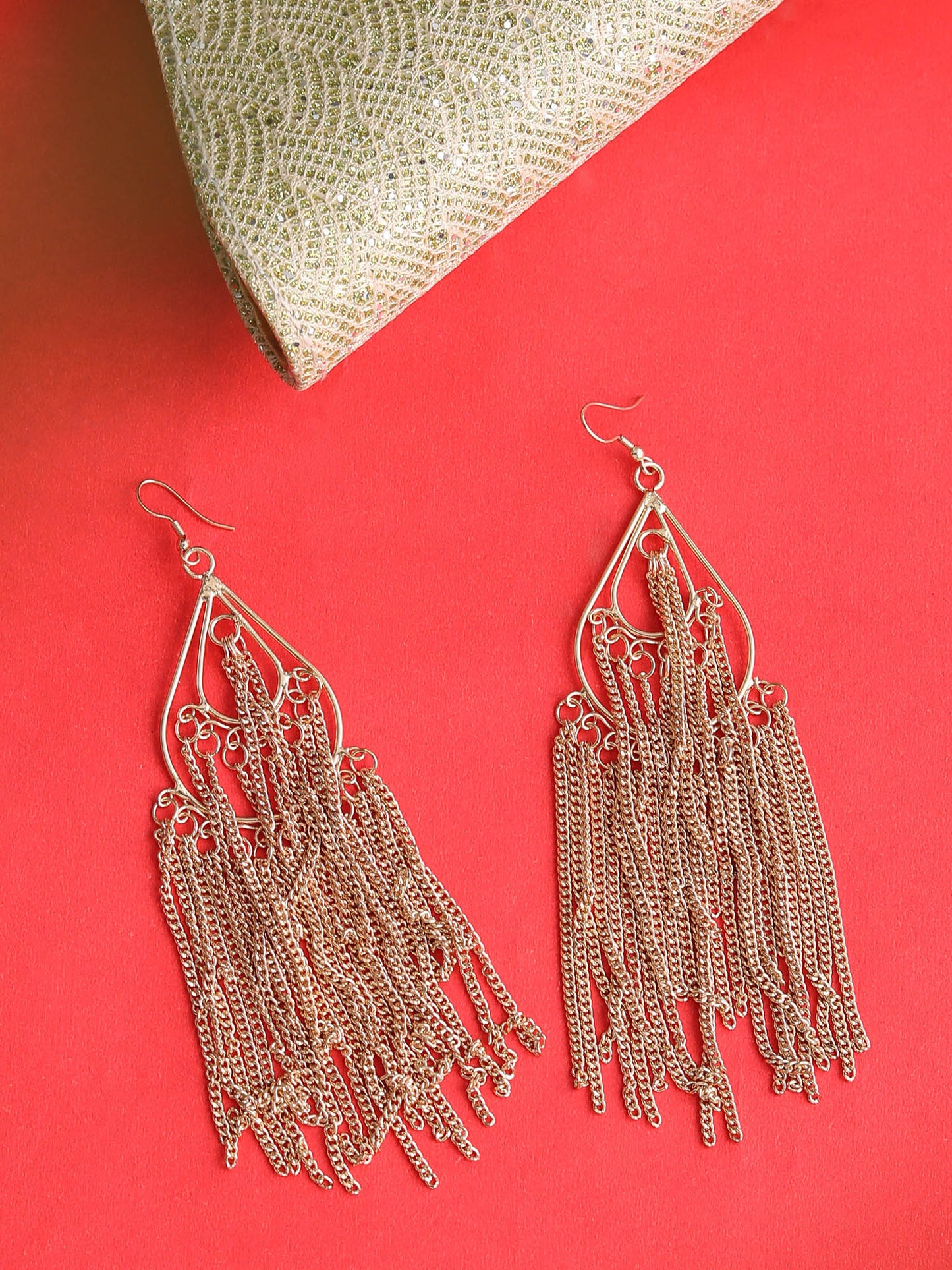 Fashionable gold tassel earrings