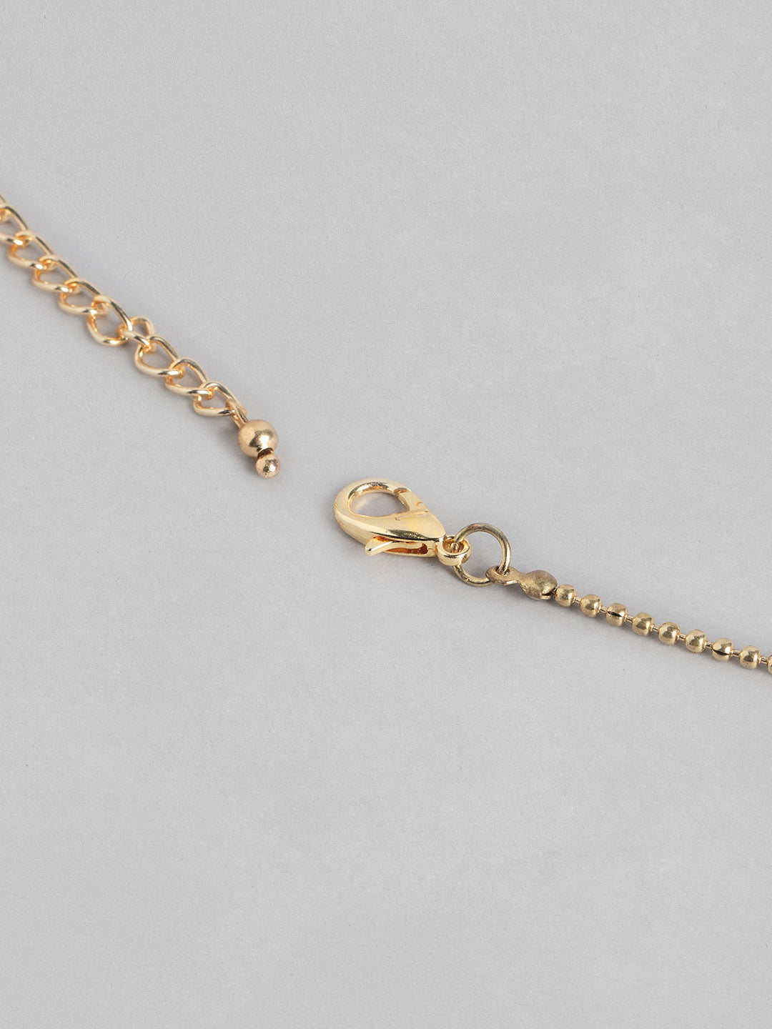 Blueberry Evil Eye pendant detailing layered chain necklace