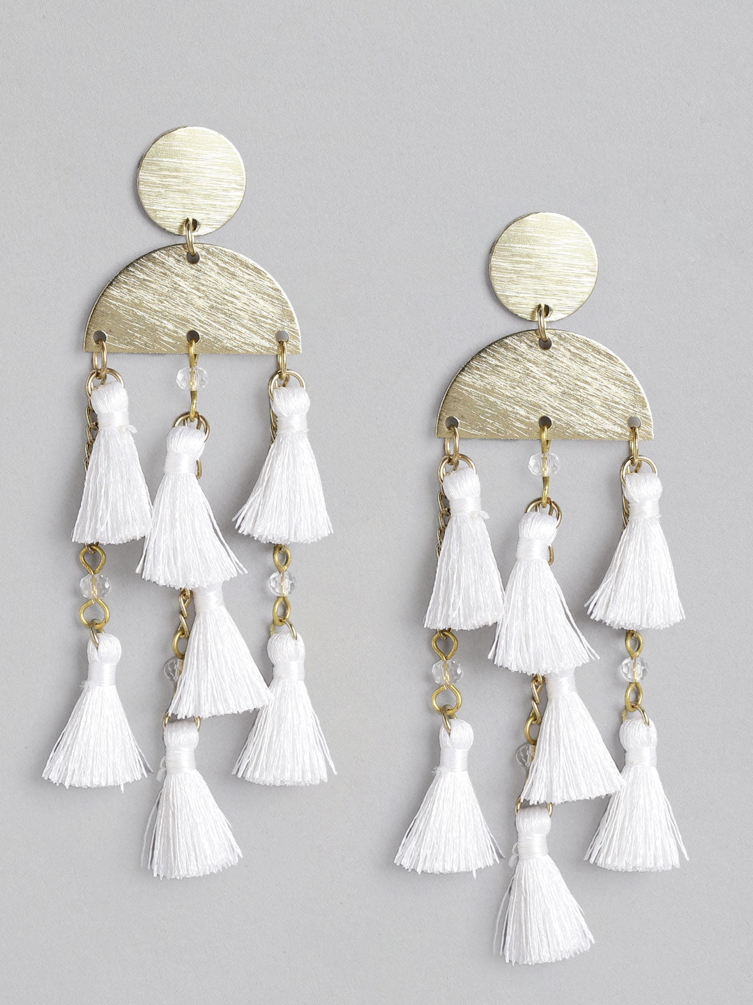 Gold and white hot sale tassel earrings