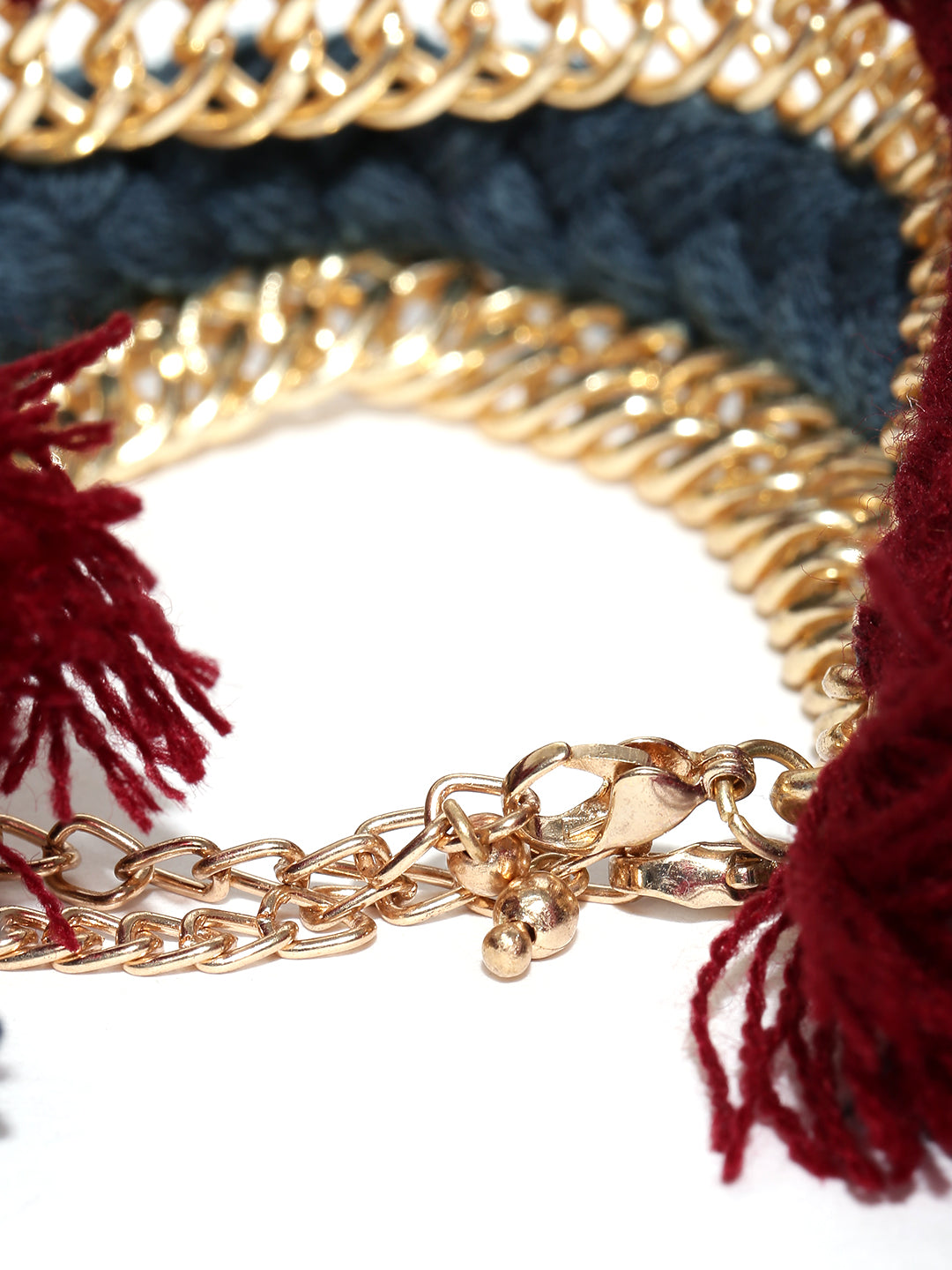 Set of 2 gold toned braided bracelets
