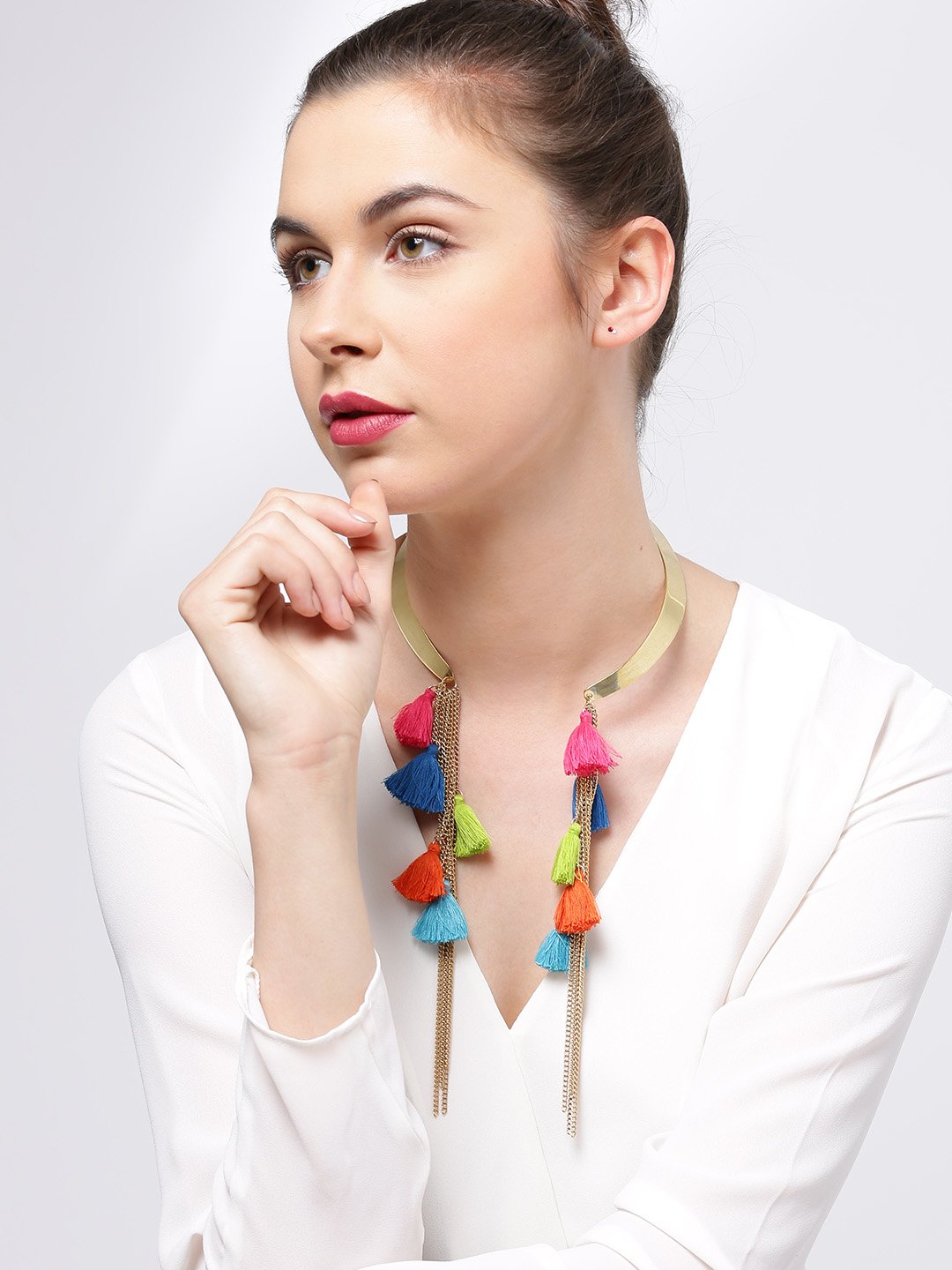 Gold toned hasli necklace with multicoloured tassel and chain danglers