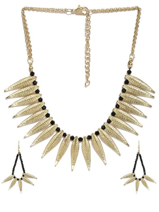 Gold toned leaf choker necklace with earrings